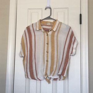 white yellow and orange striped tied shirt